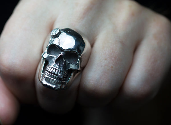 Sterling silver skull rings.