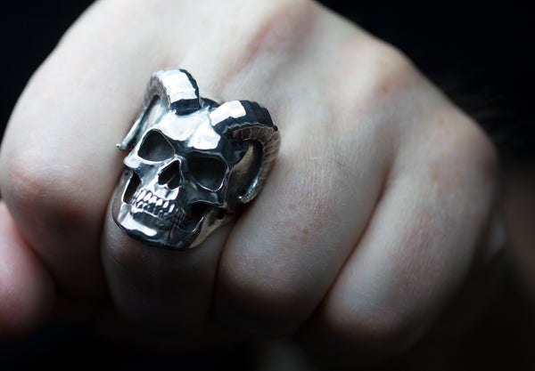 Sterling silver rams horn skull rings.