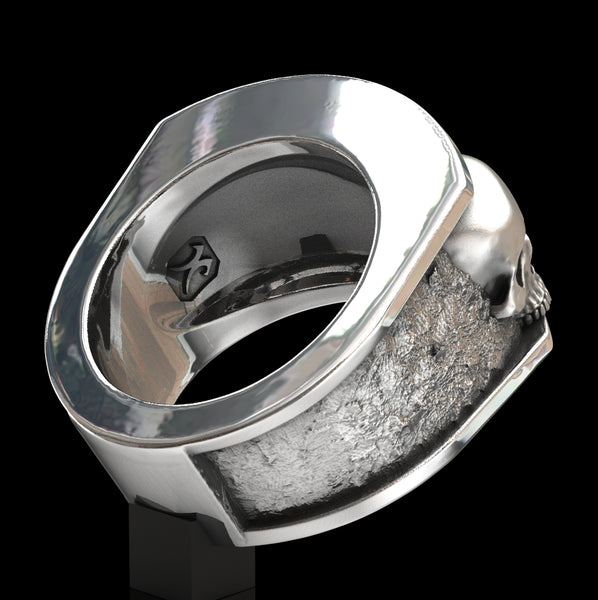 Three skull ring