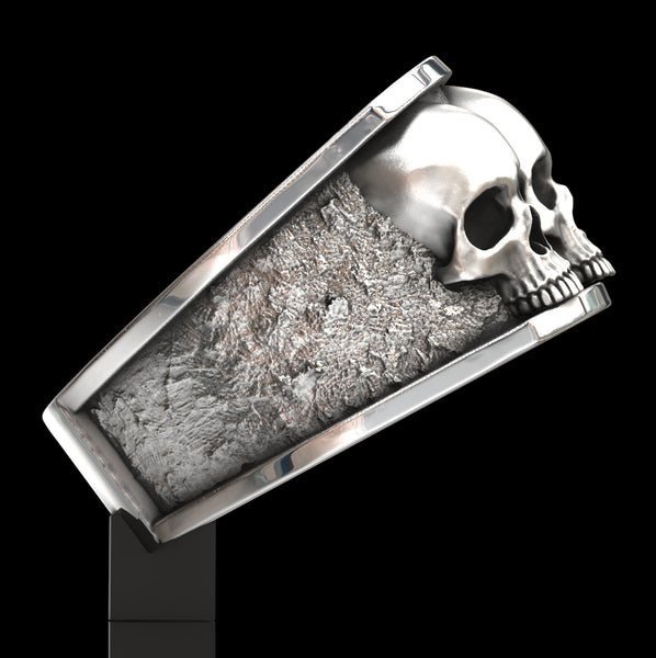 Three skull ring