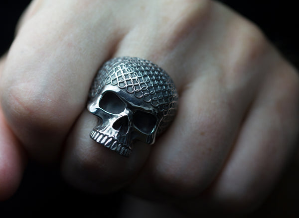 Sterling silver chain mail skull rings.