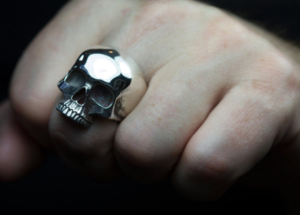 Sterling silver half Skull rings.