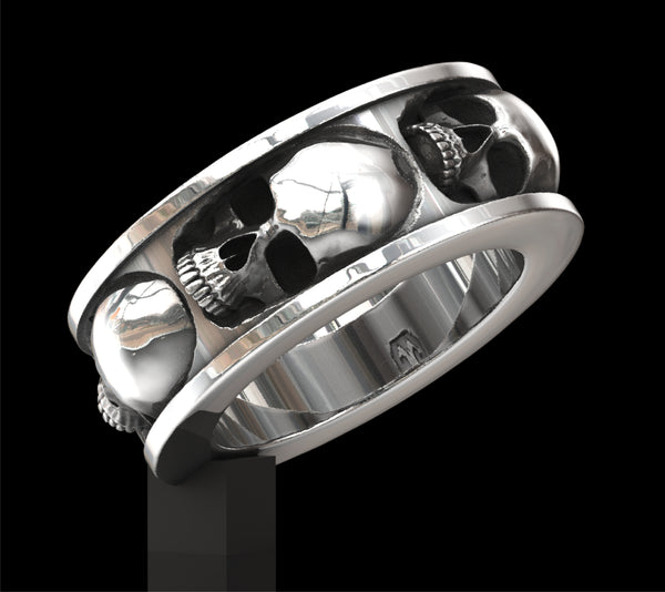 Five skull band ring